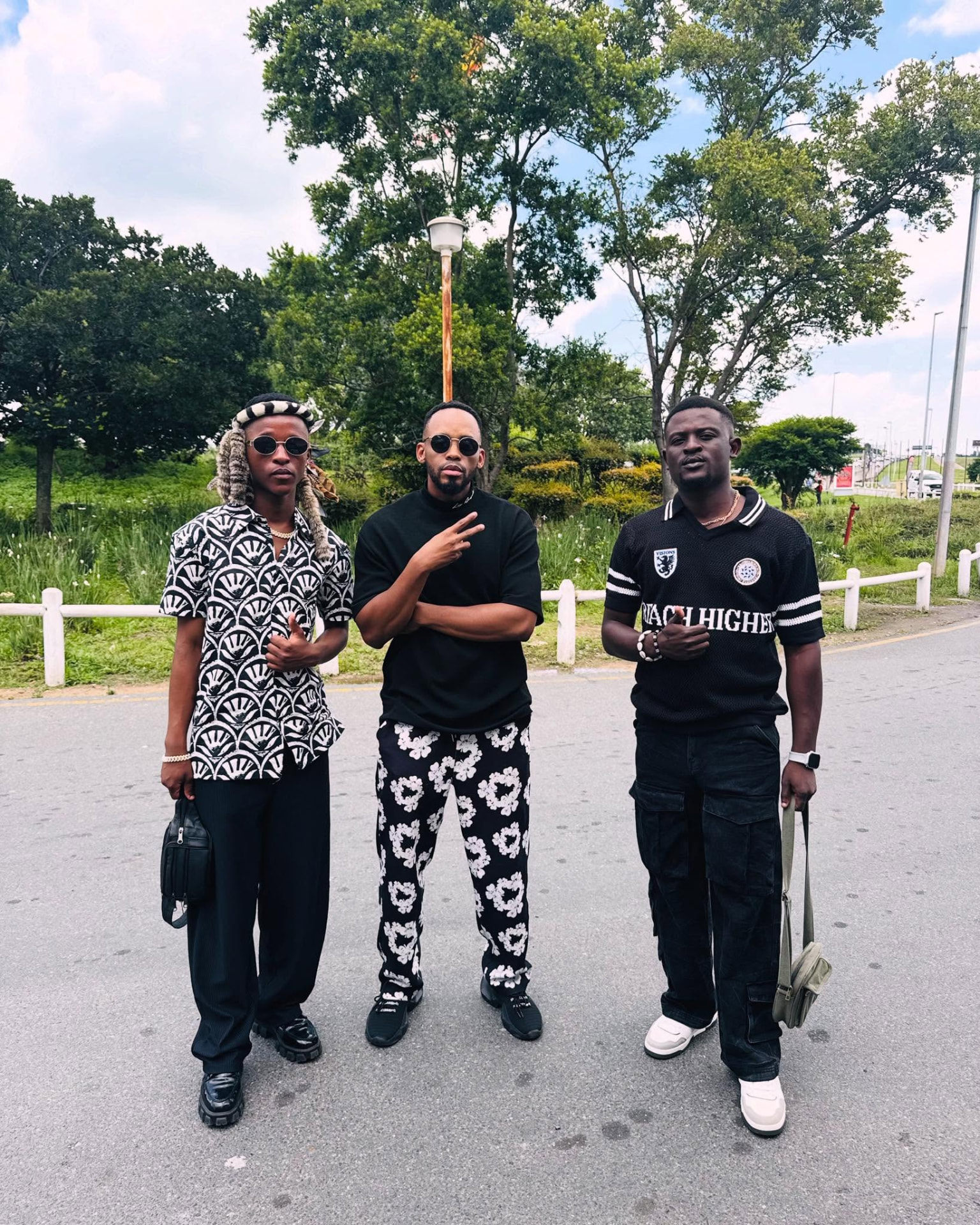 Sqiniseko SqinQ with two collaborators on the road